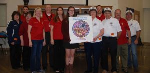 Steamboat Days volunteers present button award